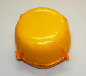 Вакуумная упаковка круглой головки сыра
